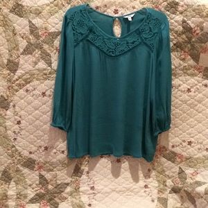Jade green tunic with lace neckline
